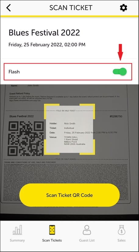 Using the Flash button if light is needed when scanning the tickets